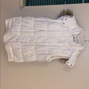 White puffy vest with fur hoodie